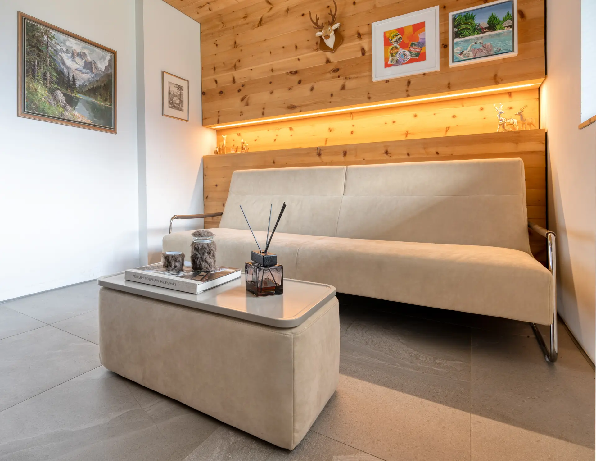 Alpine lounge with ledge lighting detail in Hinterstoder ski residence