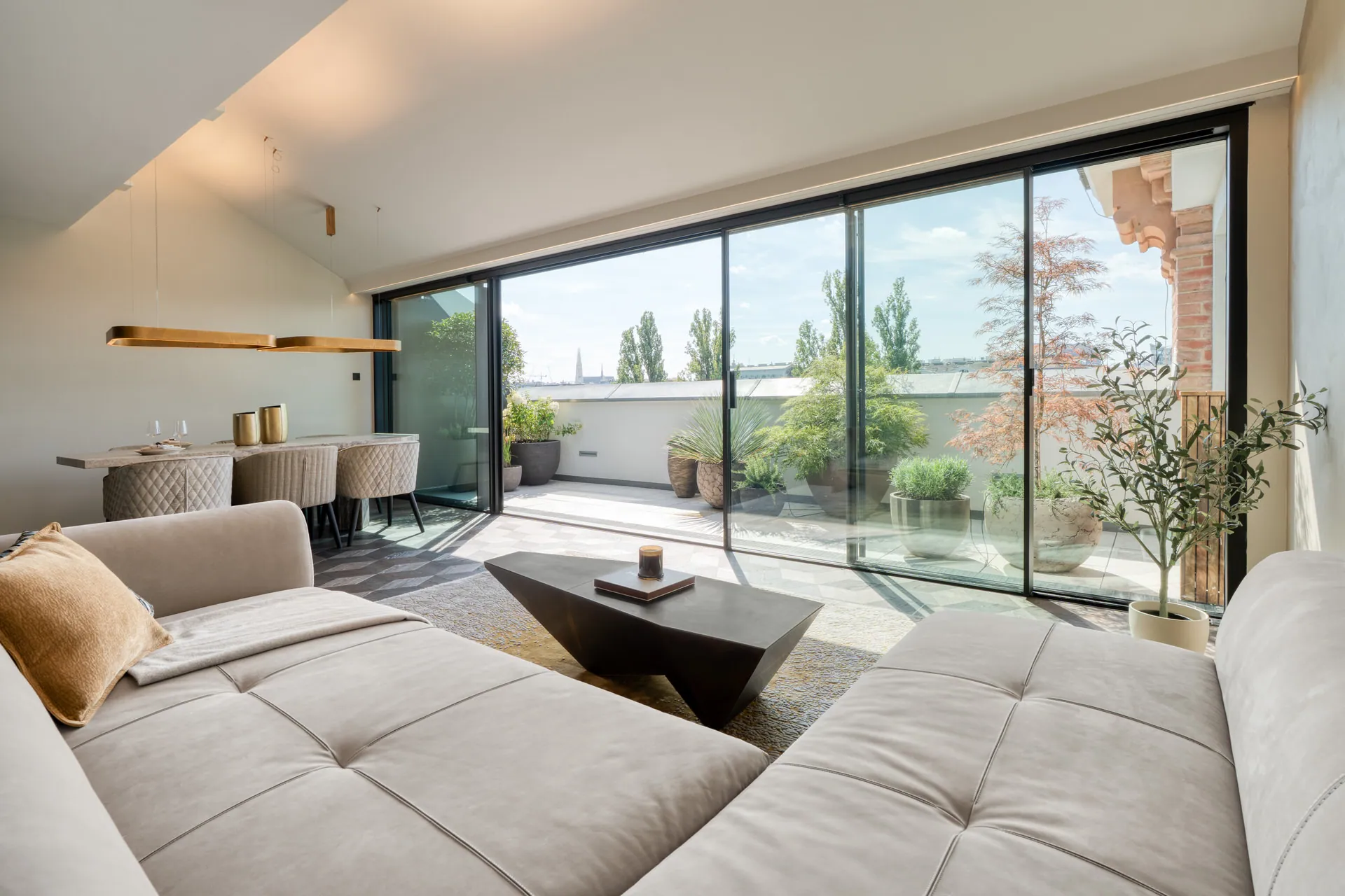 Panoramic glass facade and terrace of Vienna Leopoldstadt penthouse