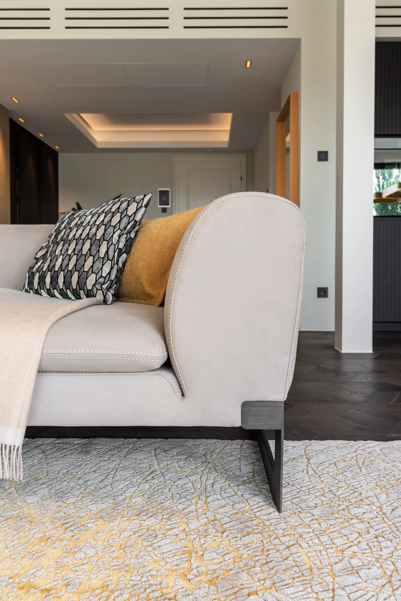 Baxter designer sofa and cushion detail in Vienna penthouse living area