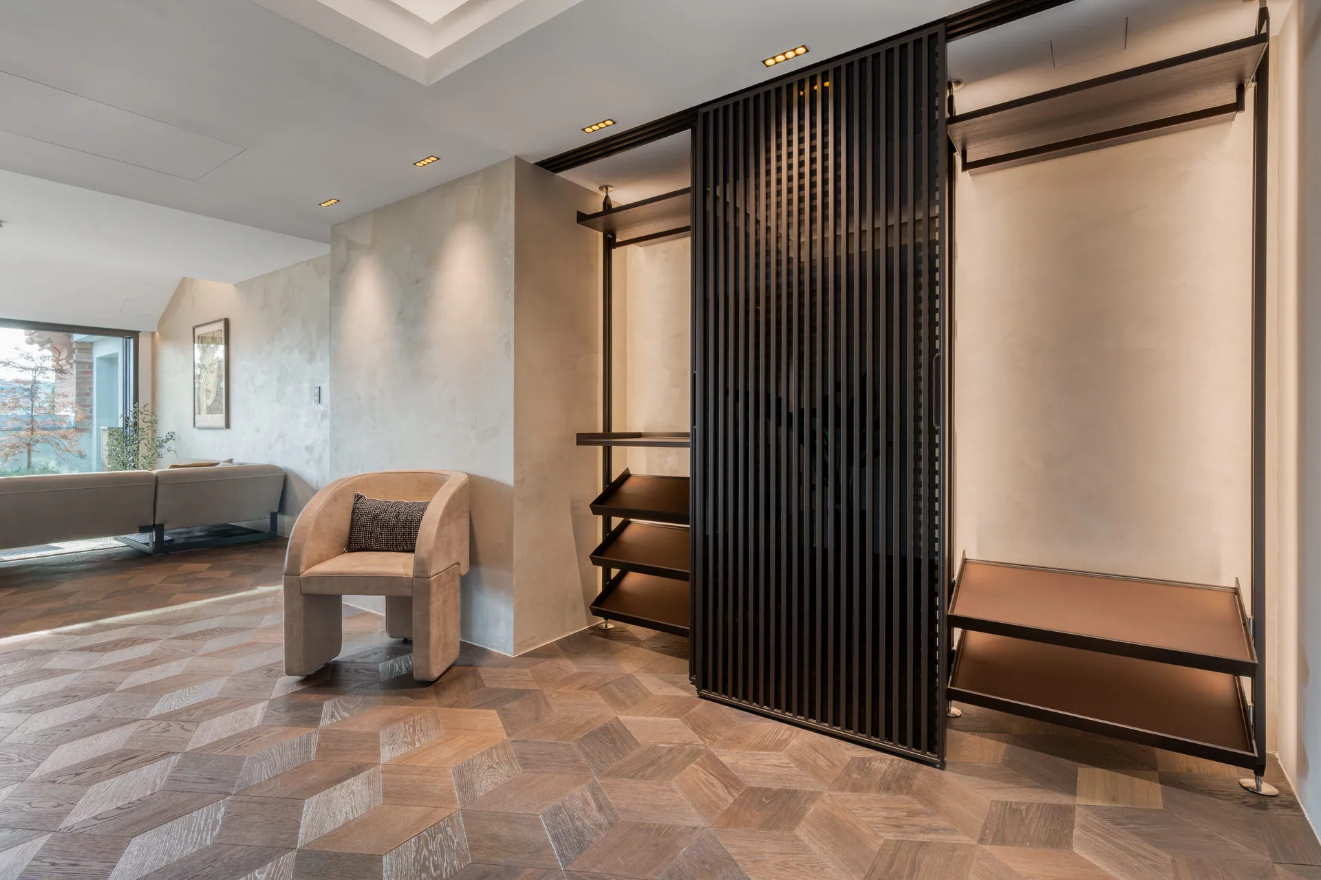 Entryway with slatted wardrobe system in exclusive Vienna penthouse