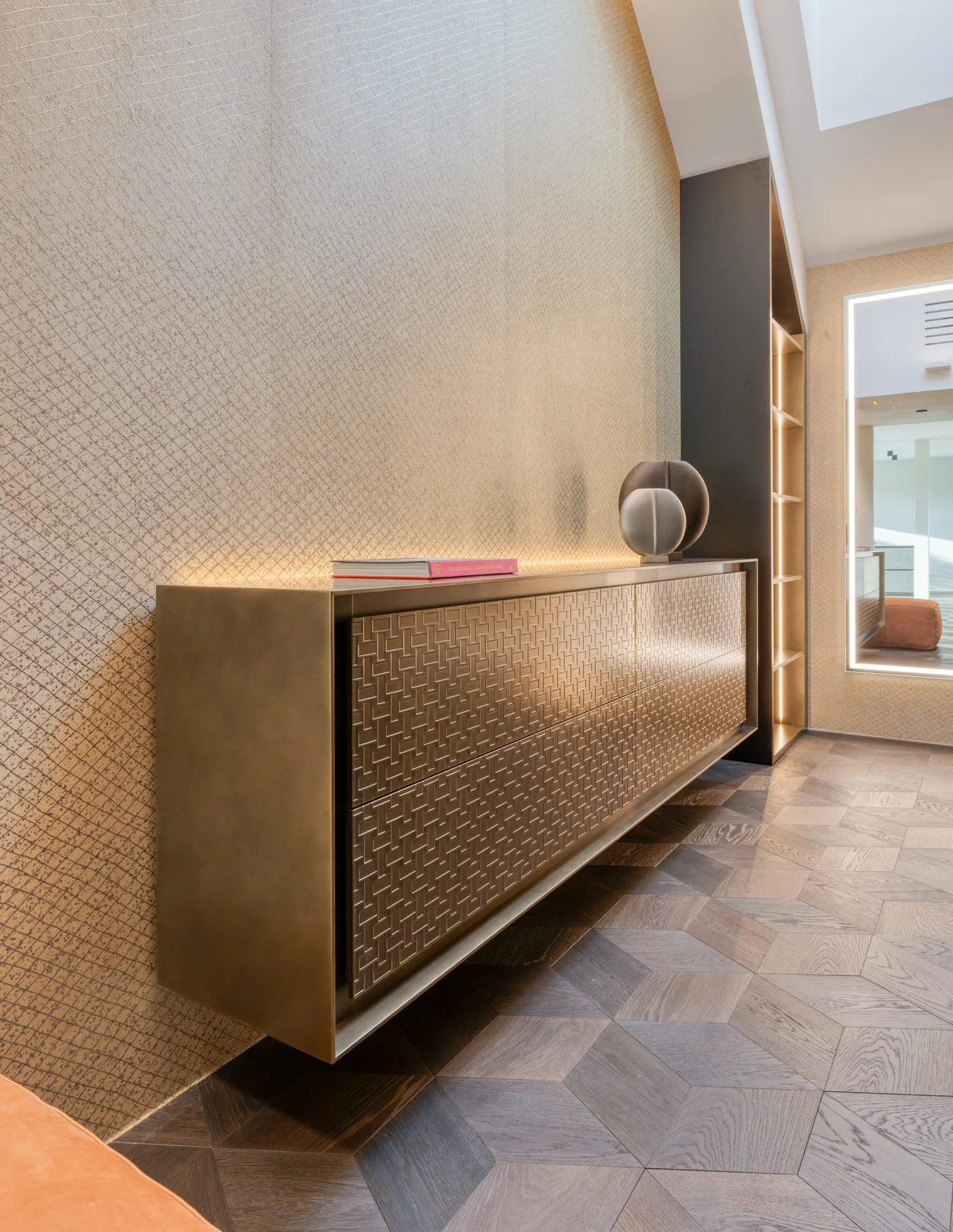 Gold hallway console and sideboard in Vienna Leopoldstadt penthouse