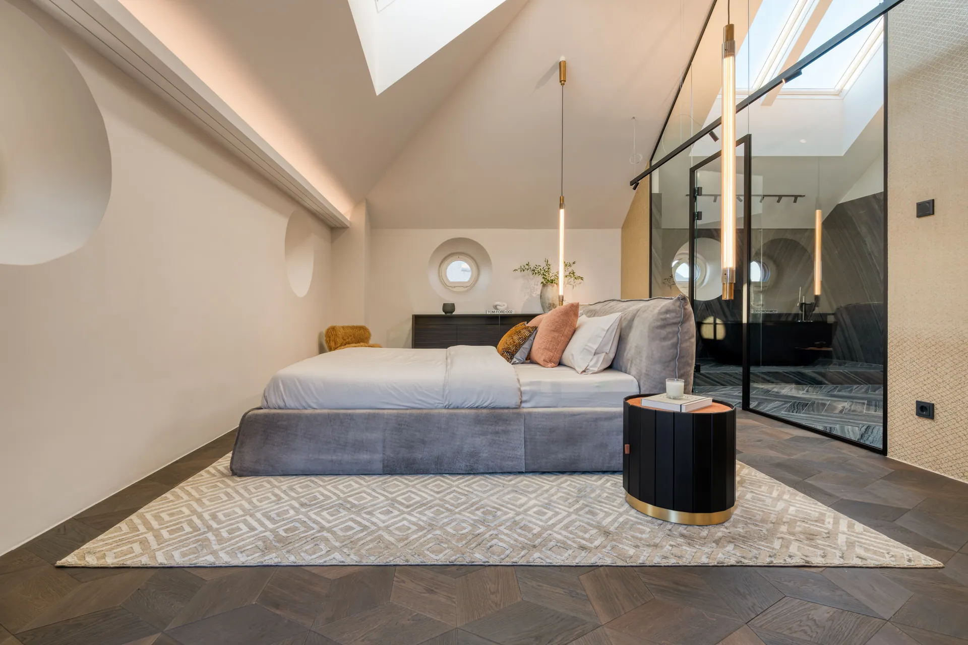 Master bedroom with skylight and ensuite access in Vienna Leopoldstadt penthouse