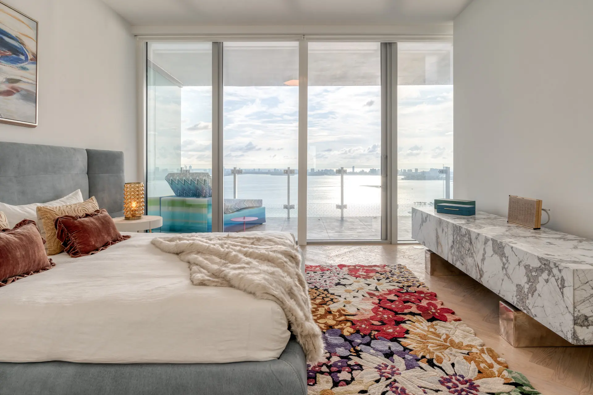 Baxter bedroom with floor-to-ceiling waterfront glass wall