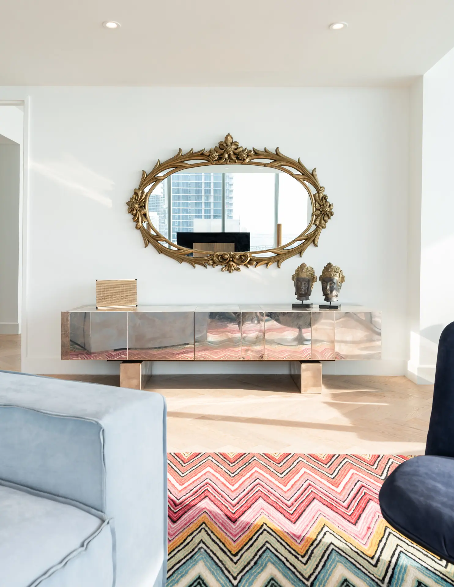 Henge sideboard with gold ornate mirror in Miami penthouse