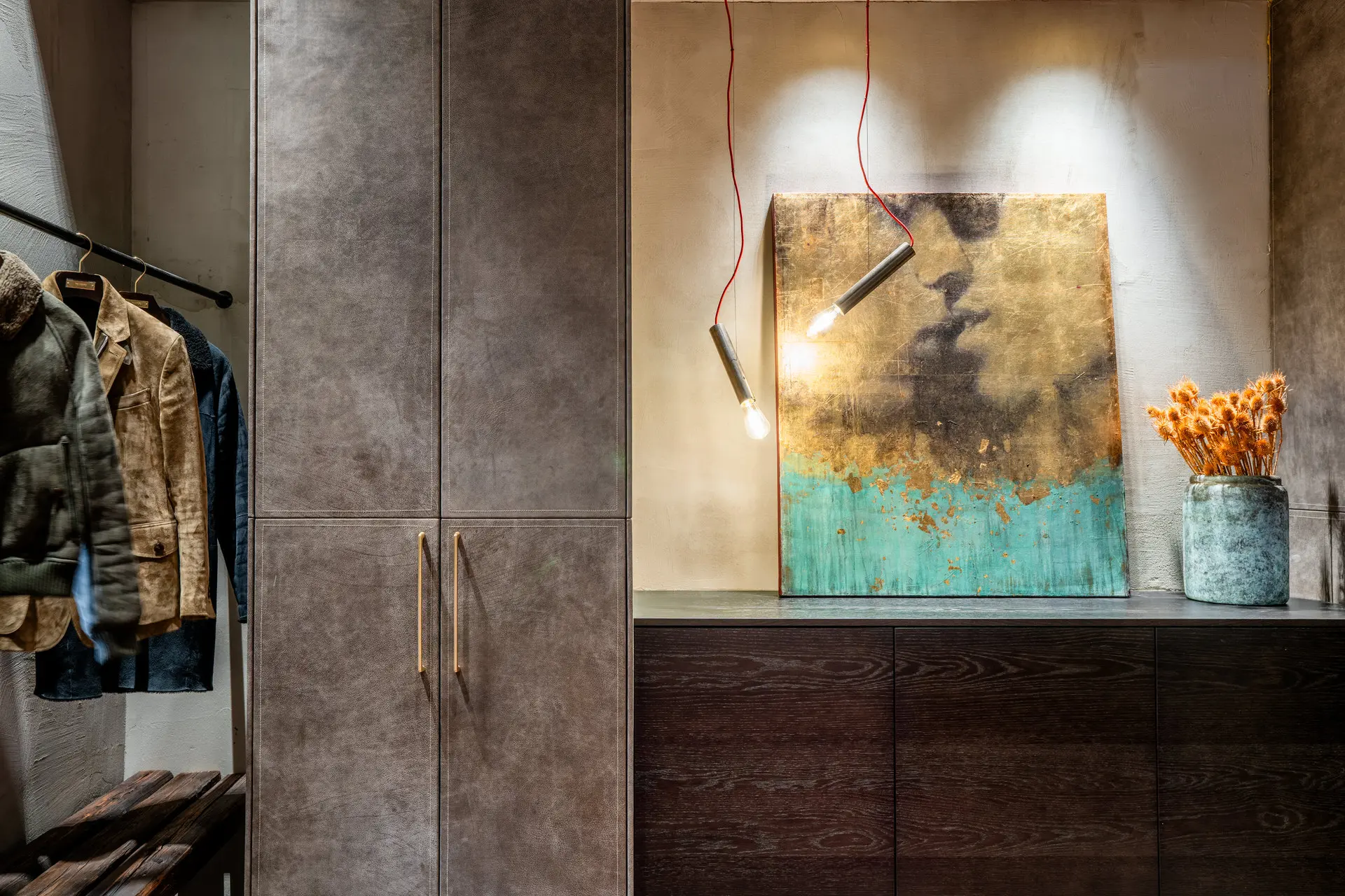 Leather-covered wardrobe in luxury chalet dressing room