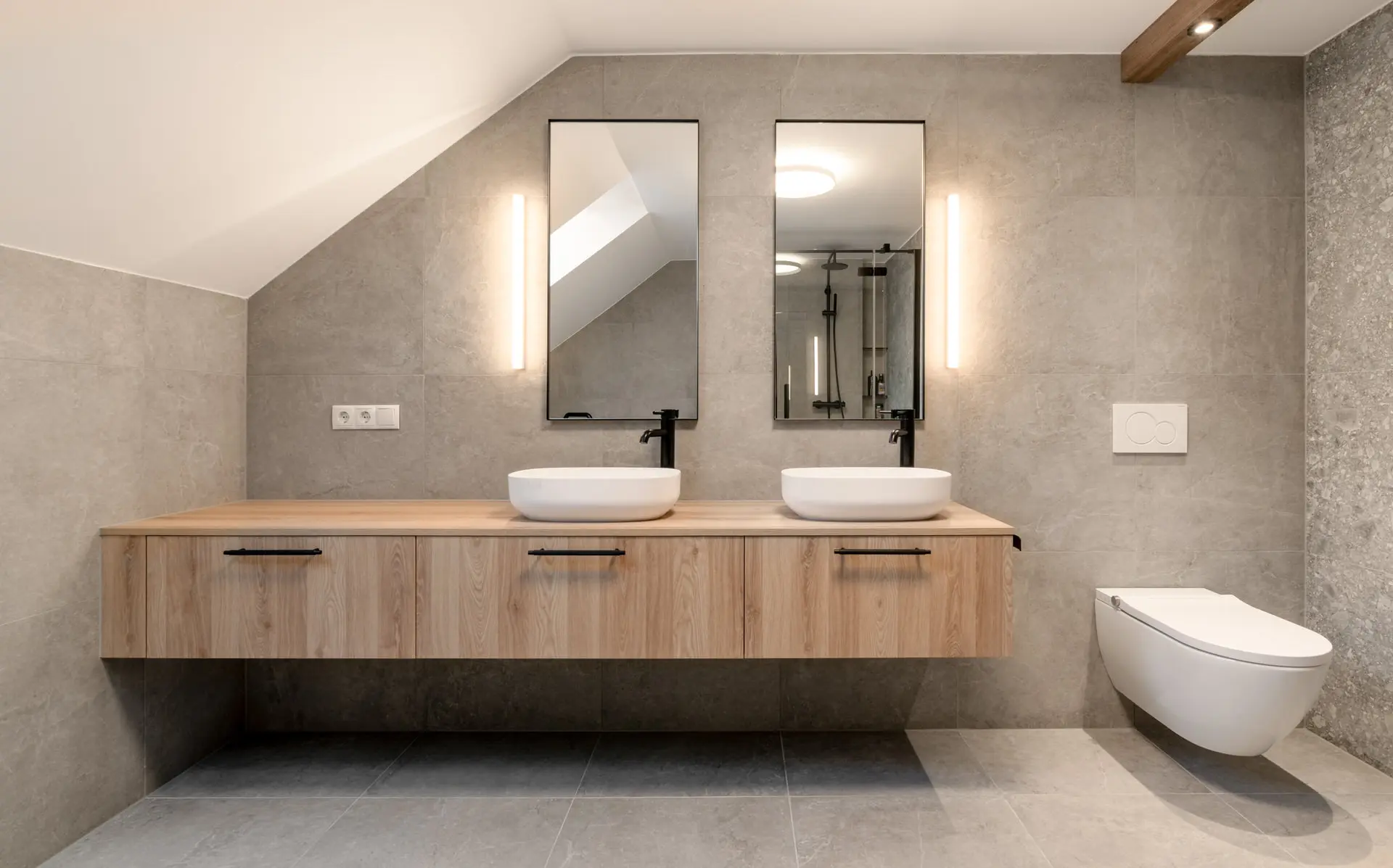 Stone tile bathroom vanity in modern Linz apartment