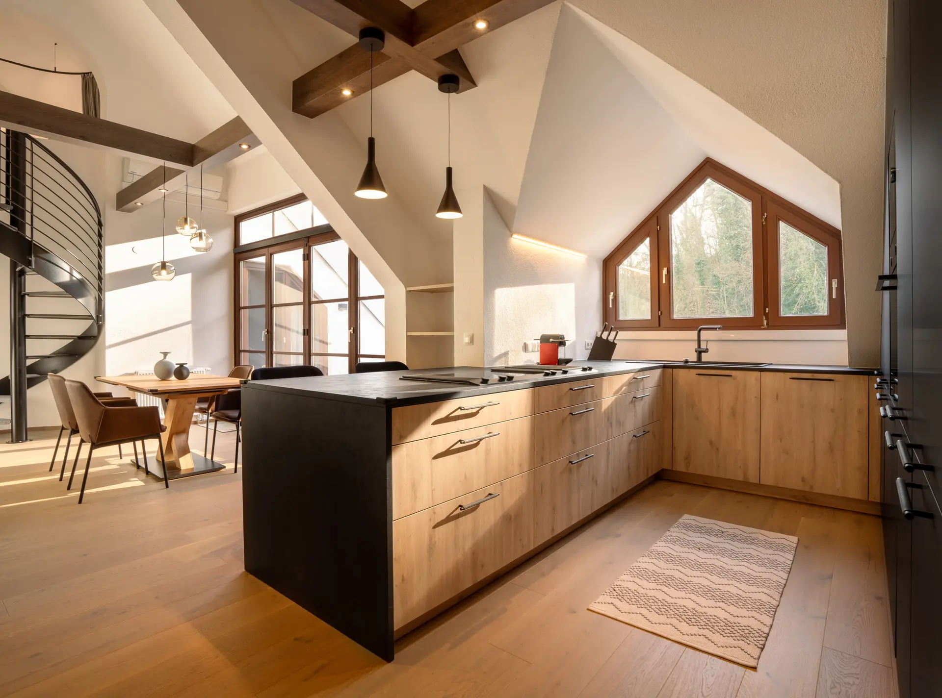 Open-plan kitchen in modern apartment in Linz