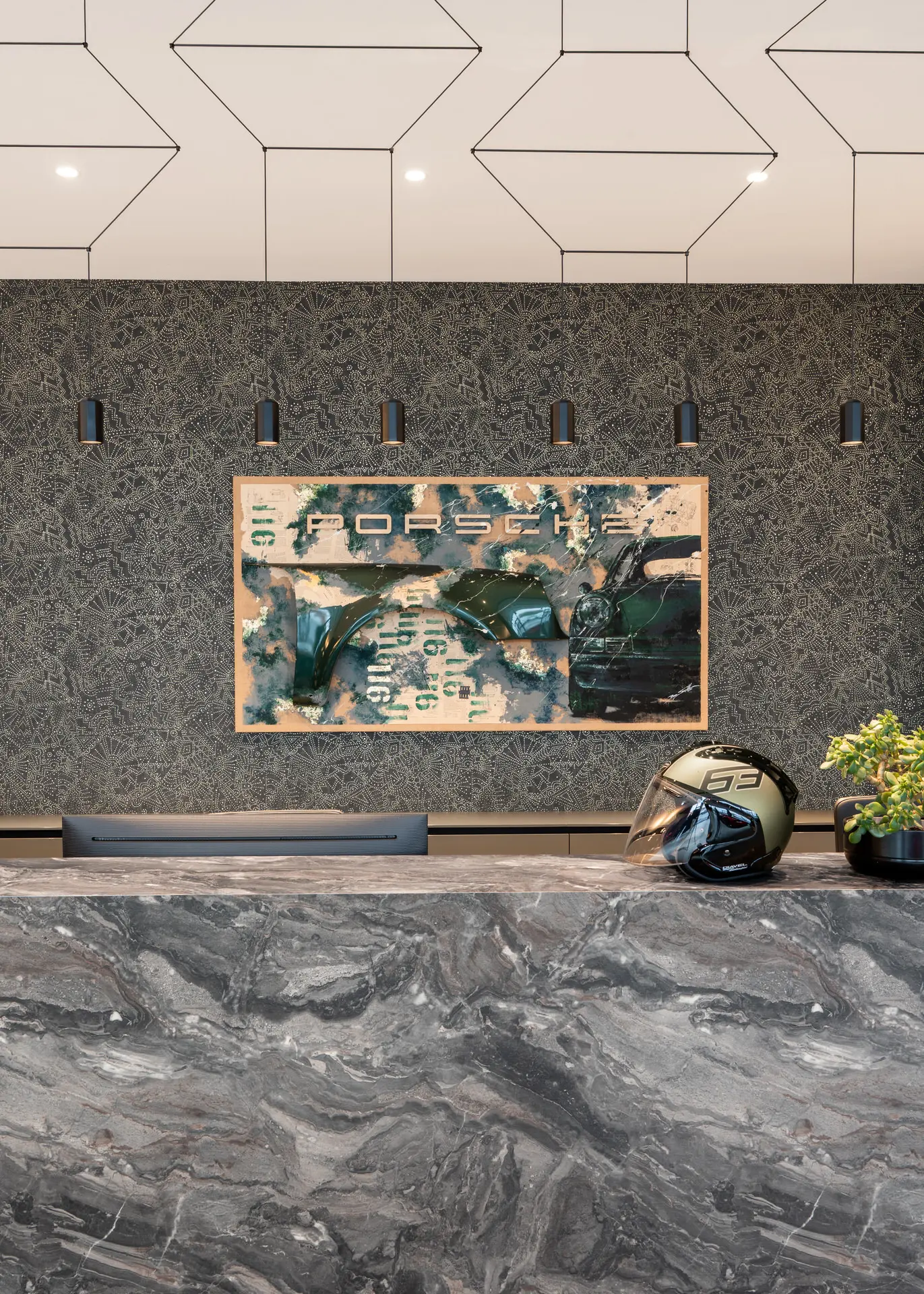 Porsche artwork and marble reception area in luxury auto showroom