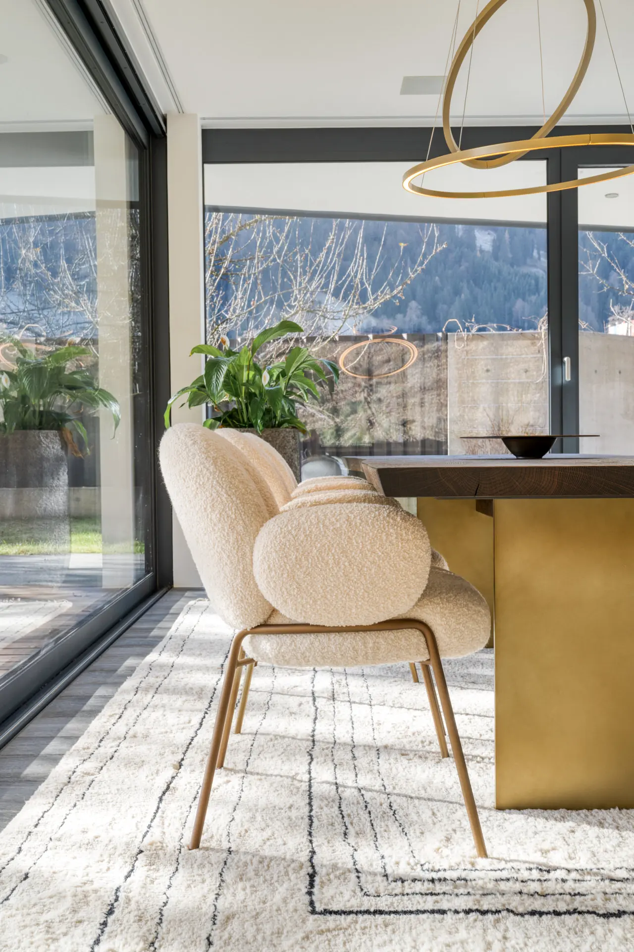 Boucle dining chair detail in Kitzbuehel luxury residence